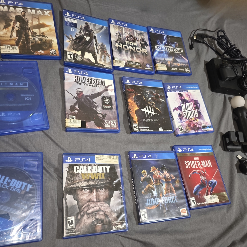 Sony PS4 Game Collection with Blue and Red Cases